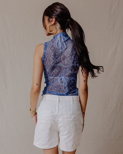 Top in mesh a fusione floreale blu