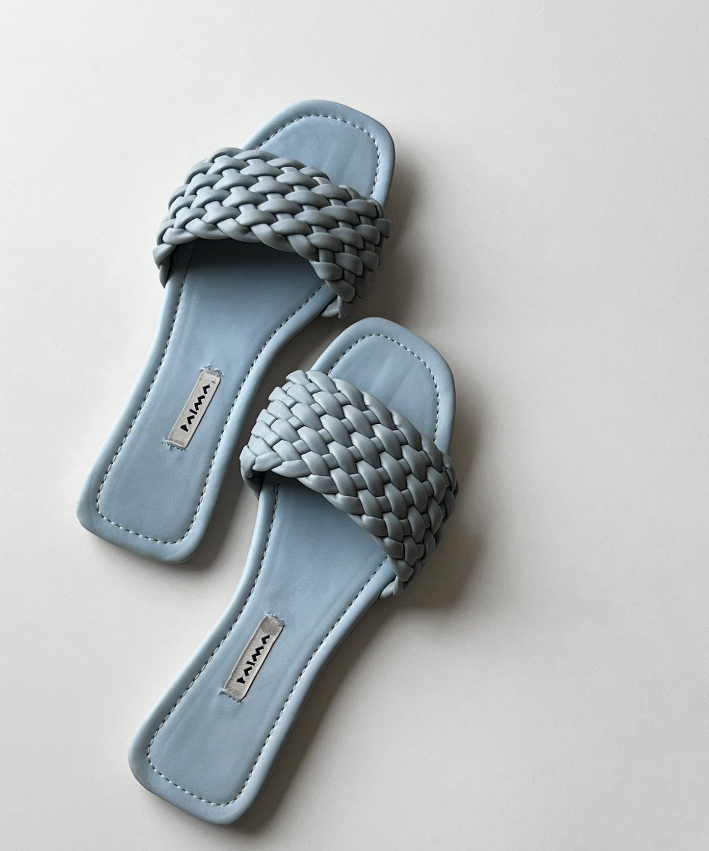 Pantofole in pelle intrecciata Baby Blue